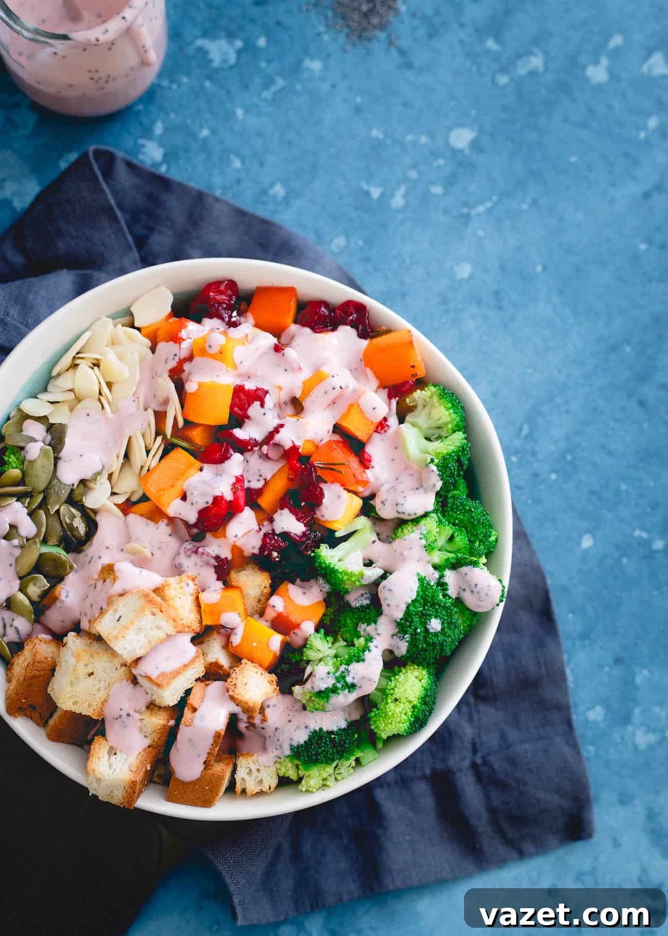 A vibrant roasted cranberry broccoli salad, beautifully drizzled with homemade dressing, ready to be served.