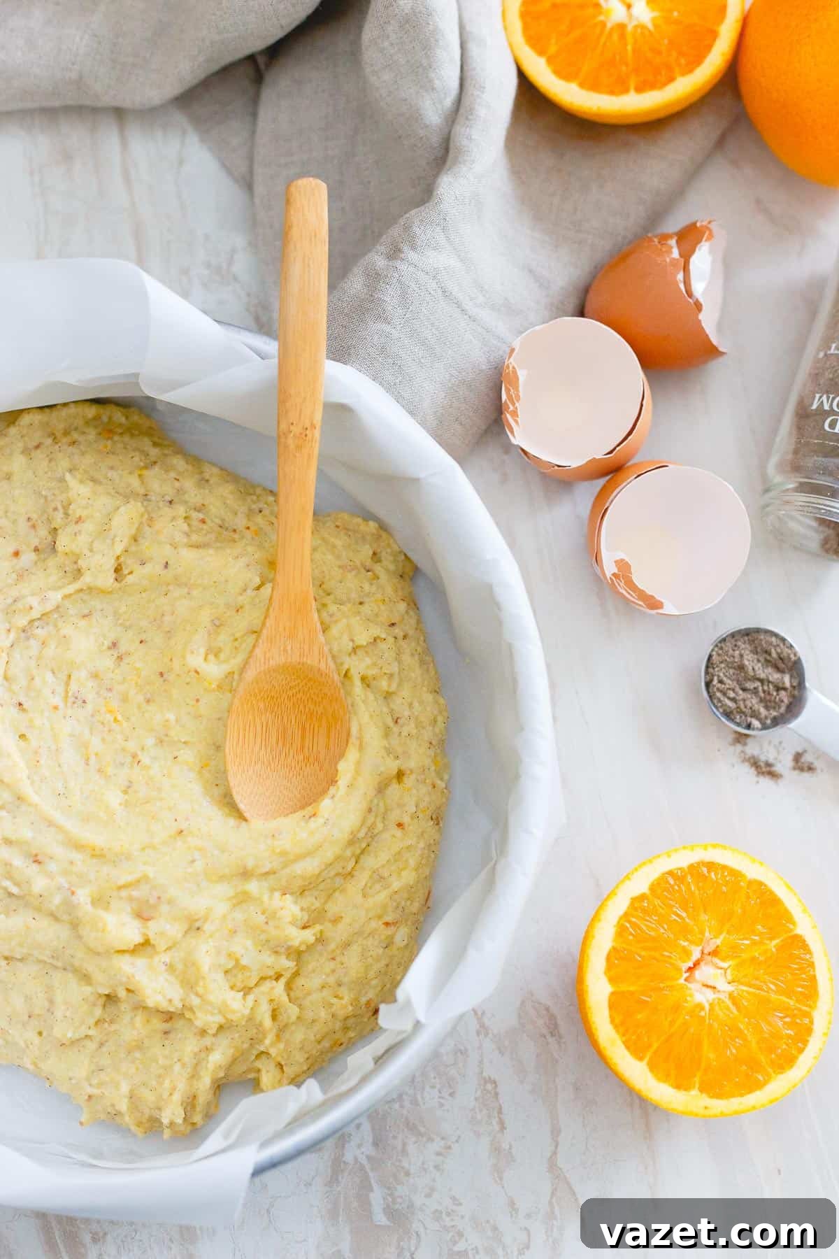 This simple winter cake is bursting with orange flavor and cardamom spice. Brushed with a sweet sticky glaze, it's simplistic yet delicious. This simple winter cake is bursting with orange flavor and cardamom spice. Brushed with a sweet sticky glaze, it's simplistic yet delicious.