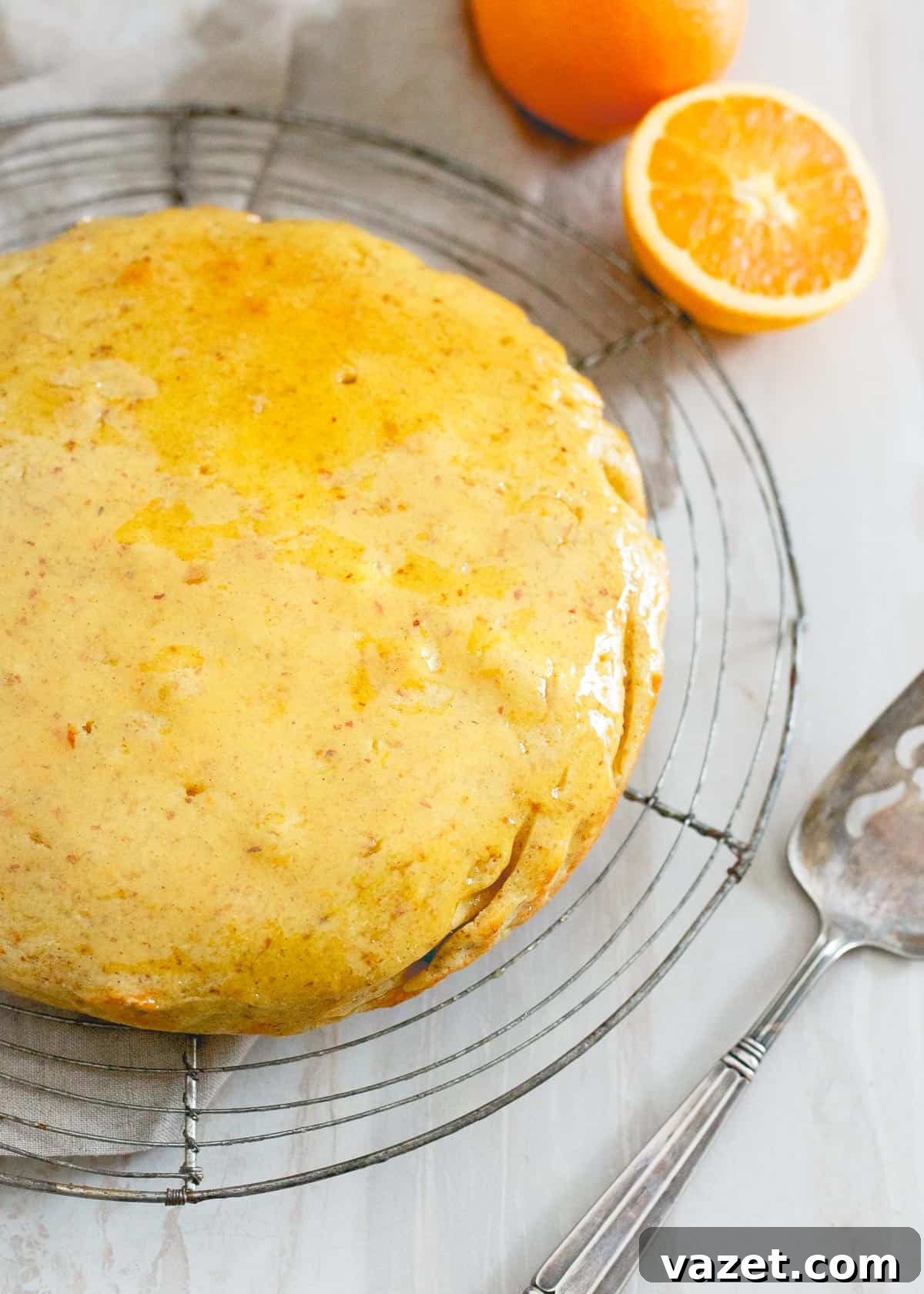 This glazed orange cardamom cake is a wonderfully simple dessert bursting with winter citrus and spice, perfect for your holiday table. This glazed orange cardamom cake is a wonderfully simple dessert bursting with winter citrus and spice, perfect for your holiday table.