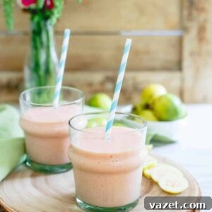 This simple guava pineapple smoothie is made with light coconut milk and a few frozen strawberries for a refreshing dairy-free summer drink.