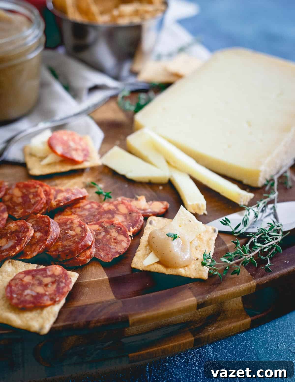 A multi-grain Crunchmaster cracker topped with sharp goat's milk cheese and a dollop of pear apple butter for the perfect fall bite.