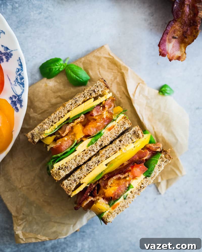 Add cheese to your BLT and sub basil for lettuce for a summer twist to the classic sandwich. Add cheese to your BLT and sub basil for lettuce for a summer twist to the classic sandwich.
