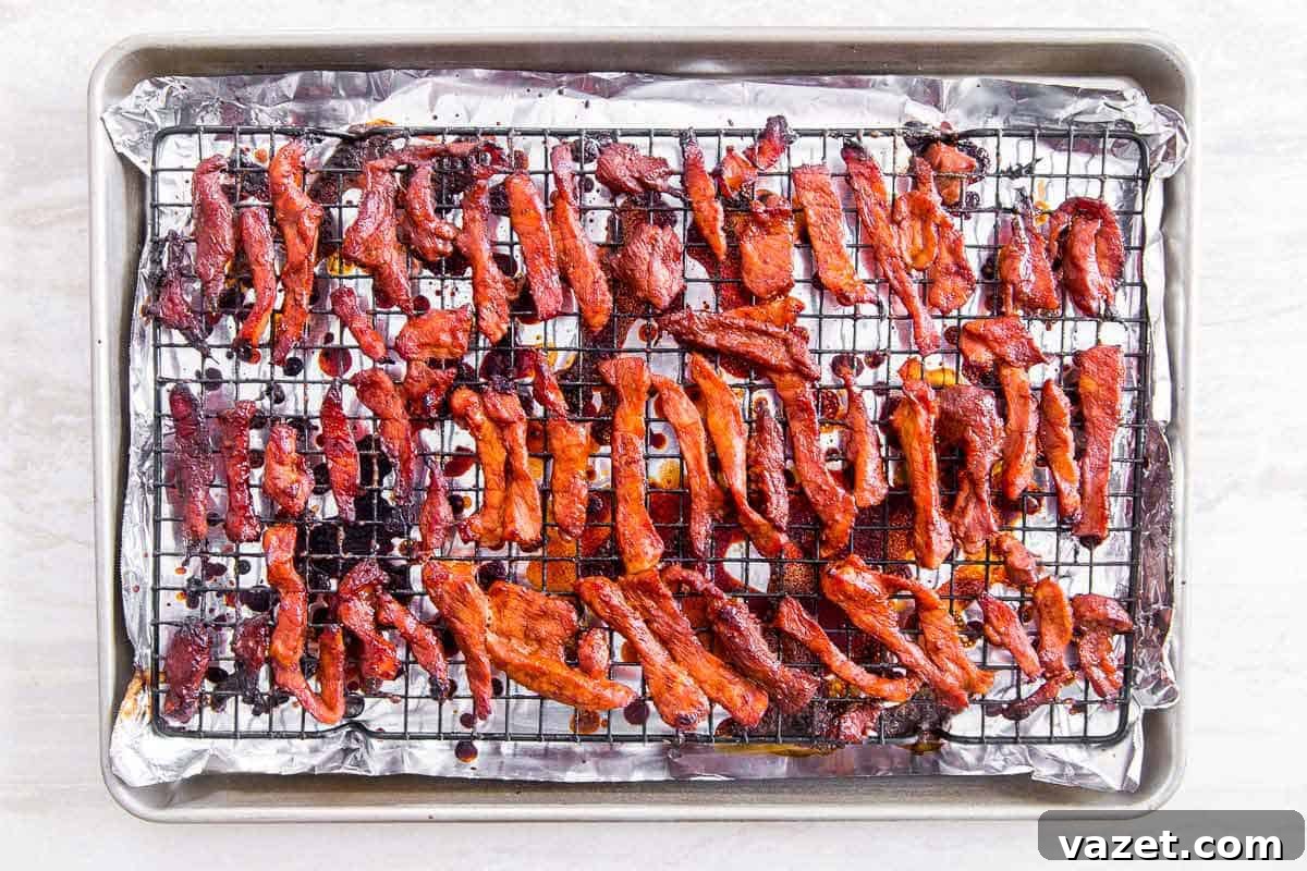 Sweet and Savory Boneless Chinese Ribs 5 After 40-45 minutes in the oven, these boneless spare ribs are sweet, sticky and with lots of crispy golden edges just like the takeout dish.