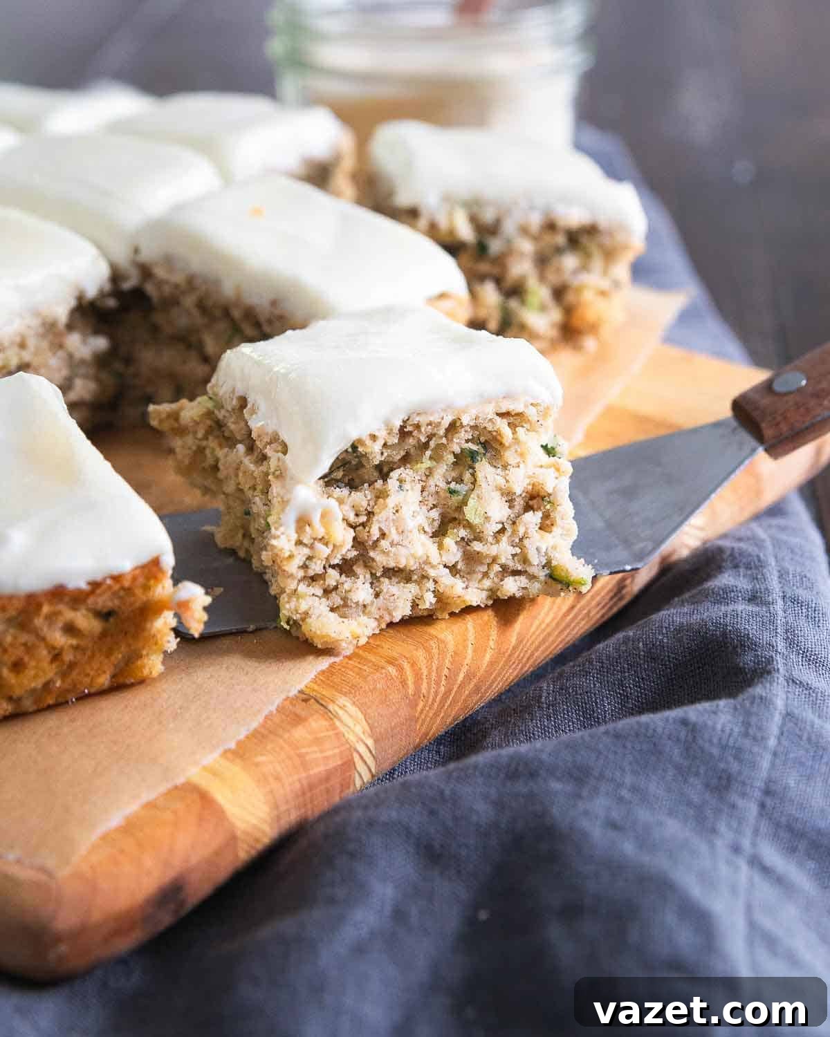Healthy zucchini bars with cream cheese frosting make the perfect afternoon snack or dessert.