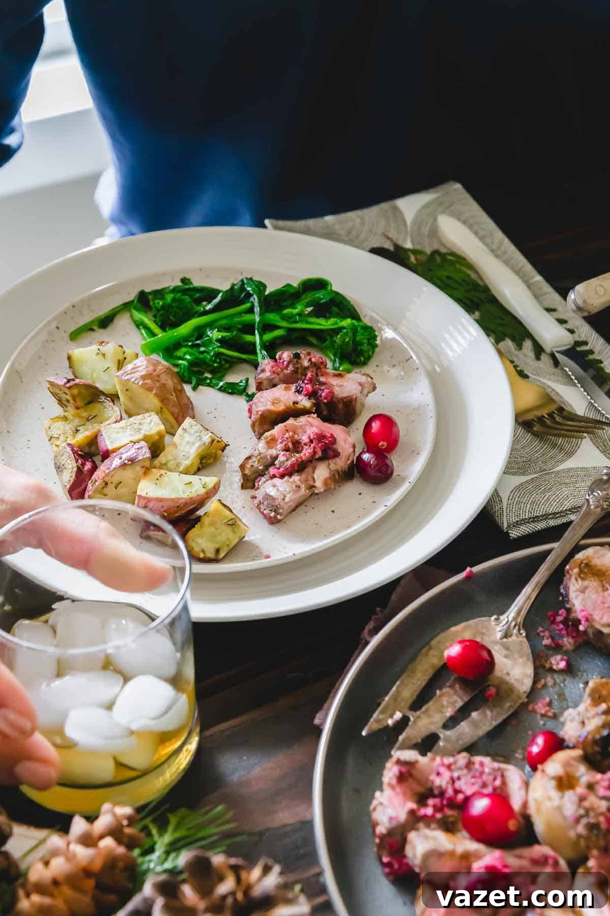 Ditch the beef and try this easy to make stuffed lamb rolled with cranberry pesto for a stunning dinner party main dish.