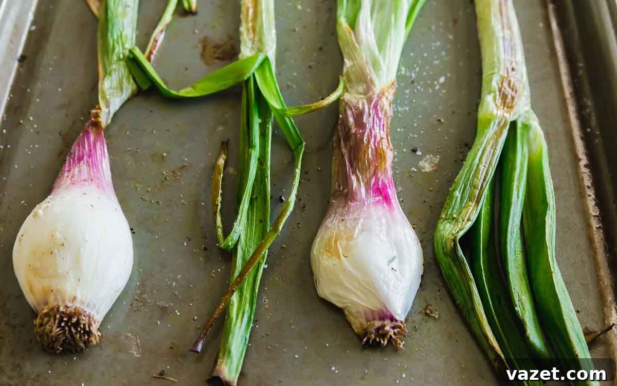 Loaded Spring Lamb Nachos 4 Roasted spring onions are a key ingredient, adding depth and sweetness to this easy spring lamb nachos recipe, enhancing its seasonal appeal.