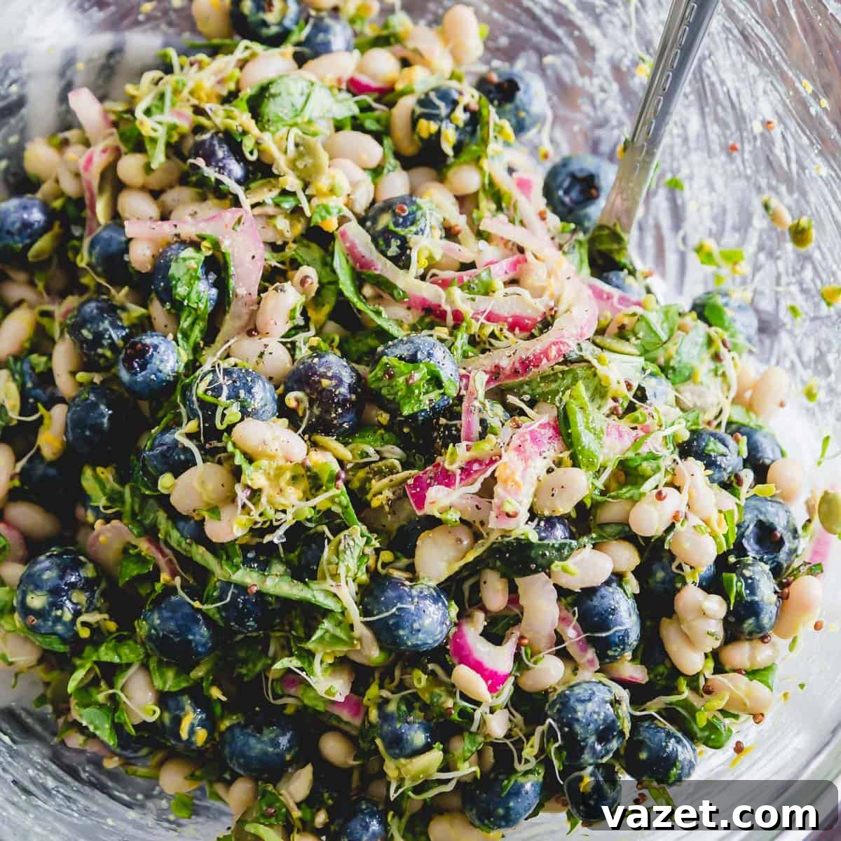 Enjoy this white bean and blueberry salad as a refreshing plant based meal or side dish to any protein.