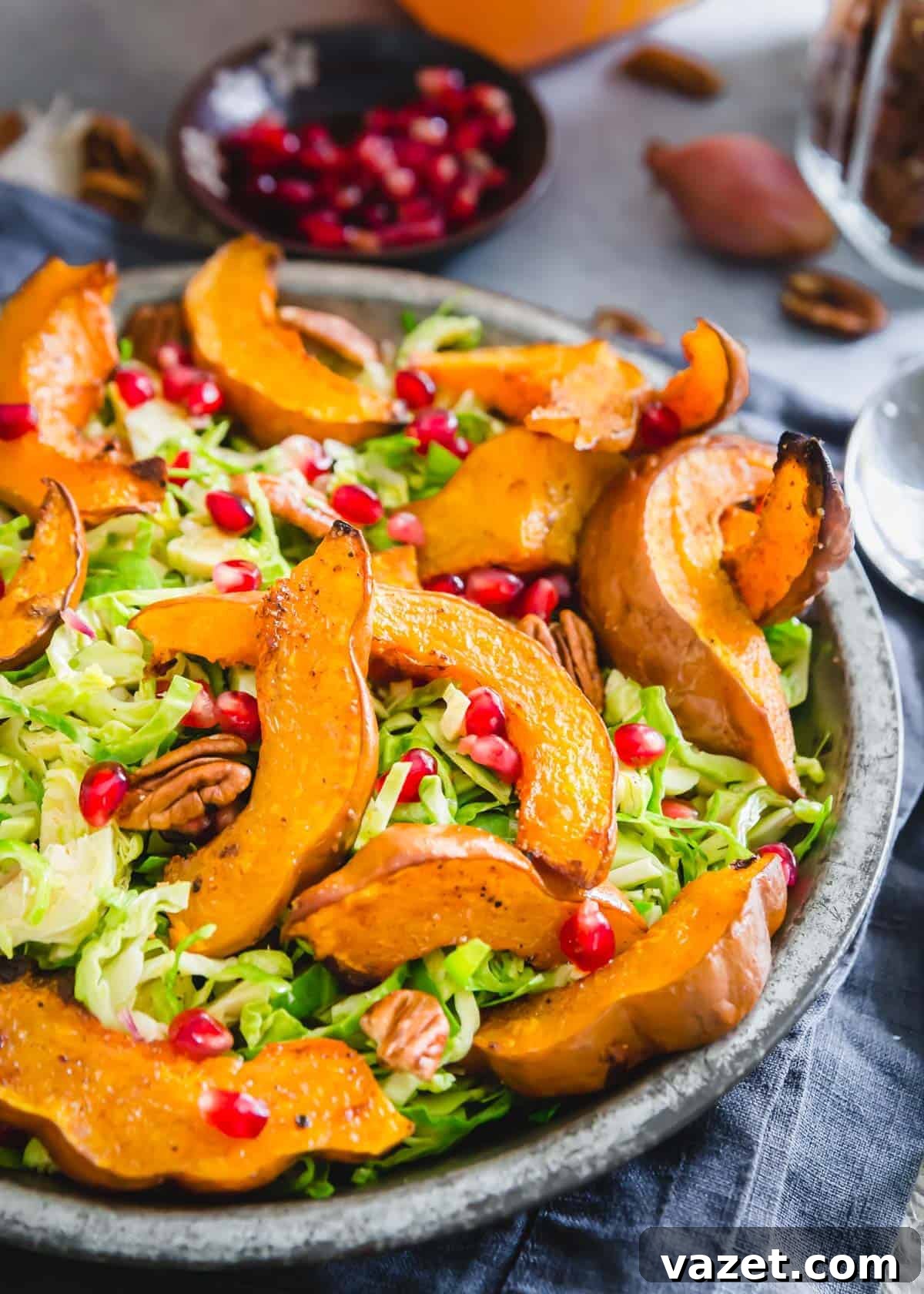 Roasted koginut squash salad with shaved brussels sprouts and pomegranates.