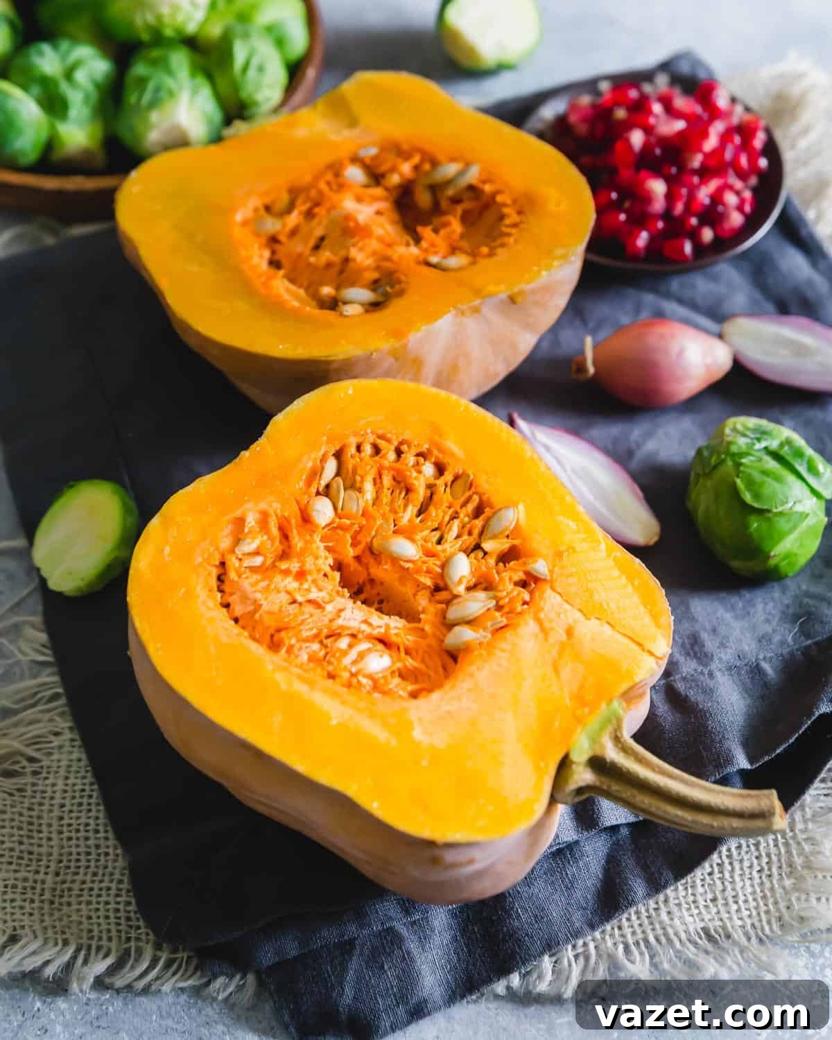 halved koginut squash with seeds
