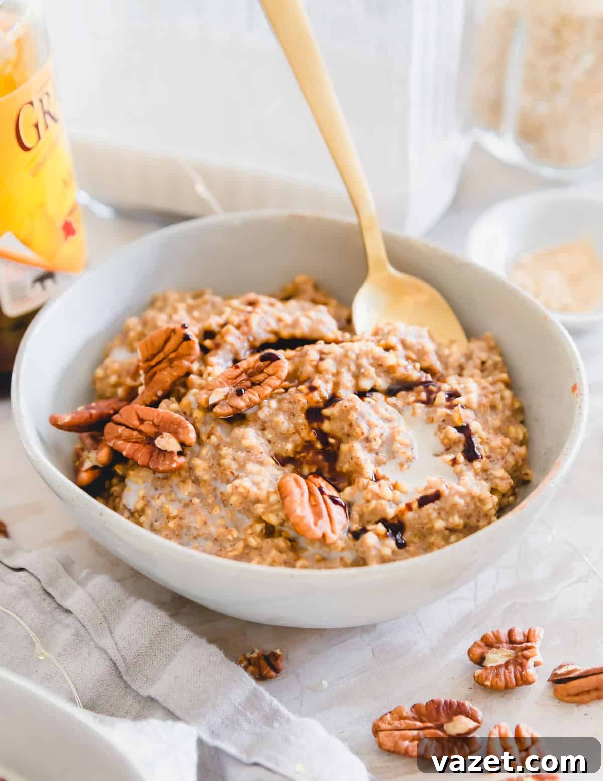 Delicious Vegan and Gluten-Free Gingerbread Oatmeal A close-up shot of a spoonful of gingerbread oatmeal, showing its creamy texture and the flecks of spice, inviting you to take a bite.