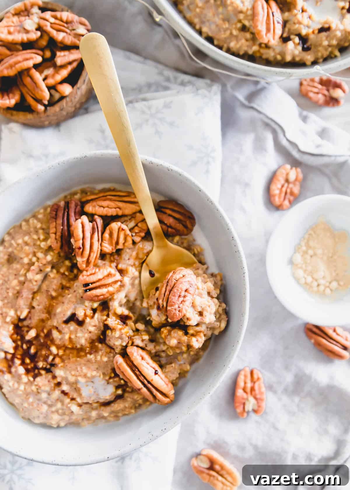 Holiday Gingerbread Oatmeal - Quick, Easy, and Delicious A rustic bowl of gingerbread oatmeal, adorned with fresh cranberries and a sprig of rosemary, capturing the essence of a festive winter breakfast.