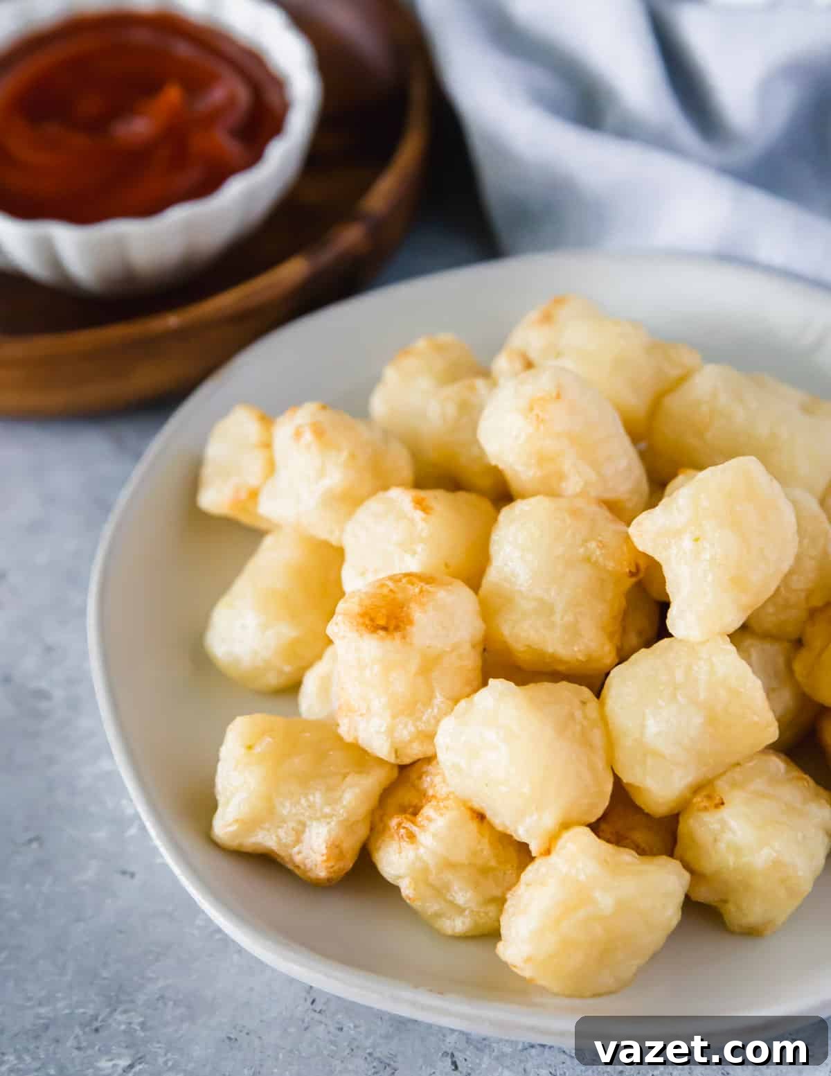 Crispy air fried cauliflower gnocchi can be eaten as an appetizer dipped in your favorite condiment like ketchup. Crispy air fried cauliflower gnocchi can be eaten as an appetizer dipped in your favorite condiment like ketchup.