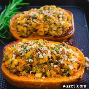 Golden Stuffed Honeynut 2 Stuffed honeynut squash on a baking sheet.