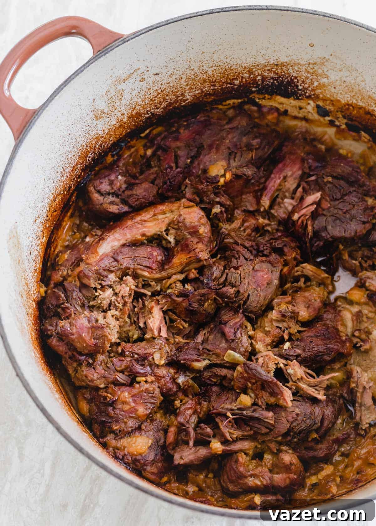 Boneless leg of lamb after braising for 3 hours in a Dutch oven. Boneless leg of lamb after braising for 3 hours in a Dutch oven.