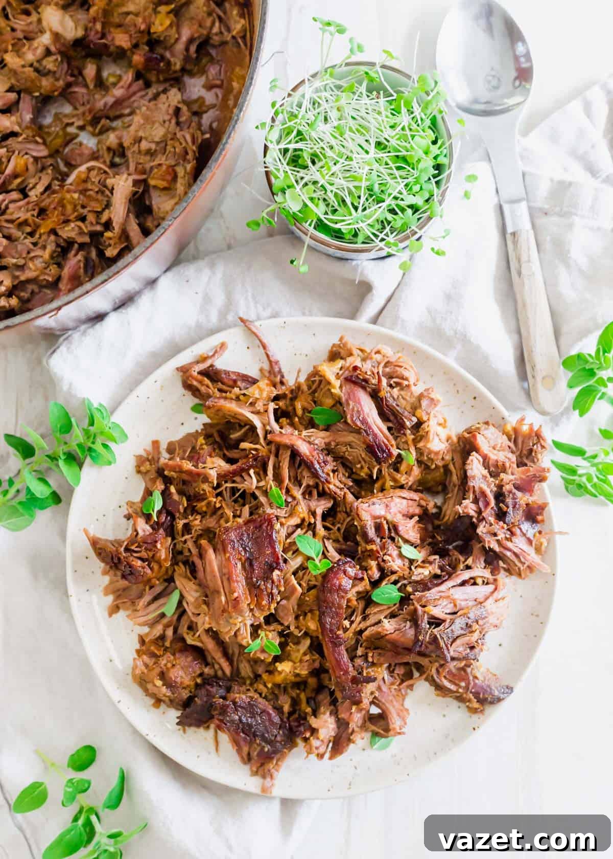 Shredded braised leg of lamb using boneless leg of lamb in Dutch oven after 3 hours. Shredded braised leg of lamb using boneless leg of lamb in Dutch oven after 3 hours.