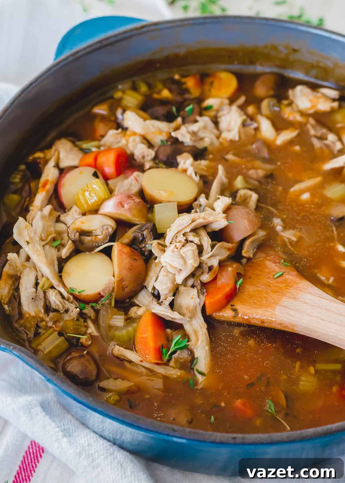 Leftover turkey stew recipe in a pot. Leftover turkey stew cooking in a pot on the stovetop.