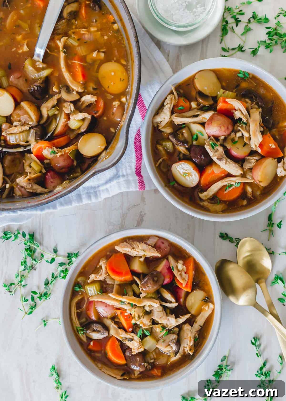 Hearty turkey stew with red potatoes and mushrooms. Hearty turkey stew with red potatoes and mushrooms in a bowl with a spoon.
