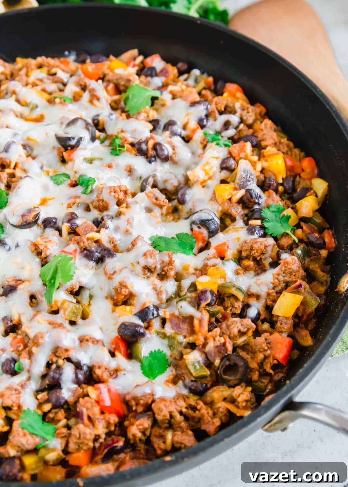 Mexican Ground Beef Skillet 4 Ground beef Mexican recipe with beans, rice, peppers and melted cheese