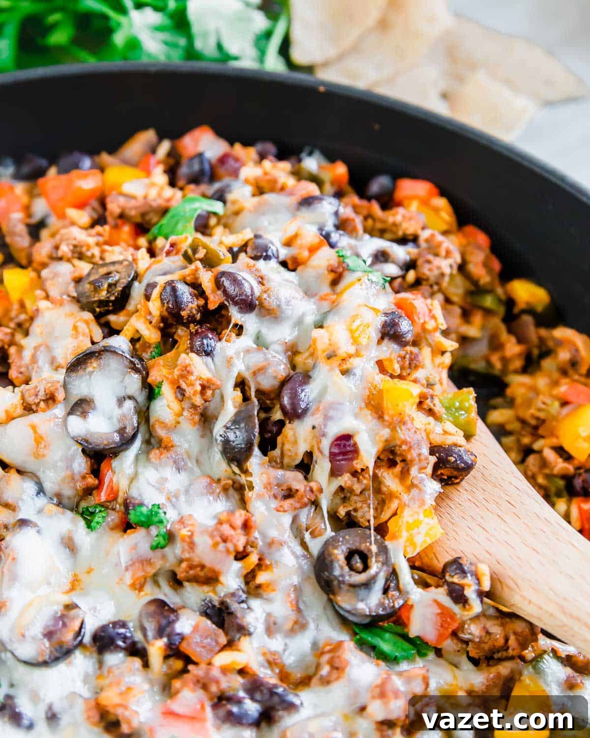 Mexican Ground Beef Skillet 7 Mexican ground beef skillet recipe with a wooden serving spatula