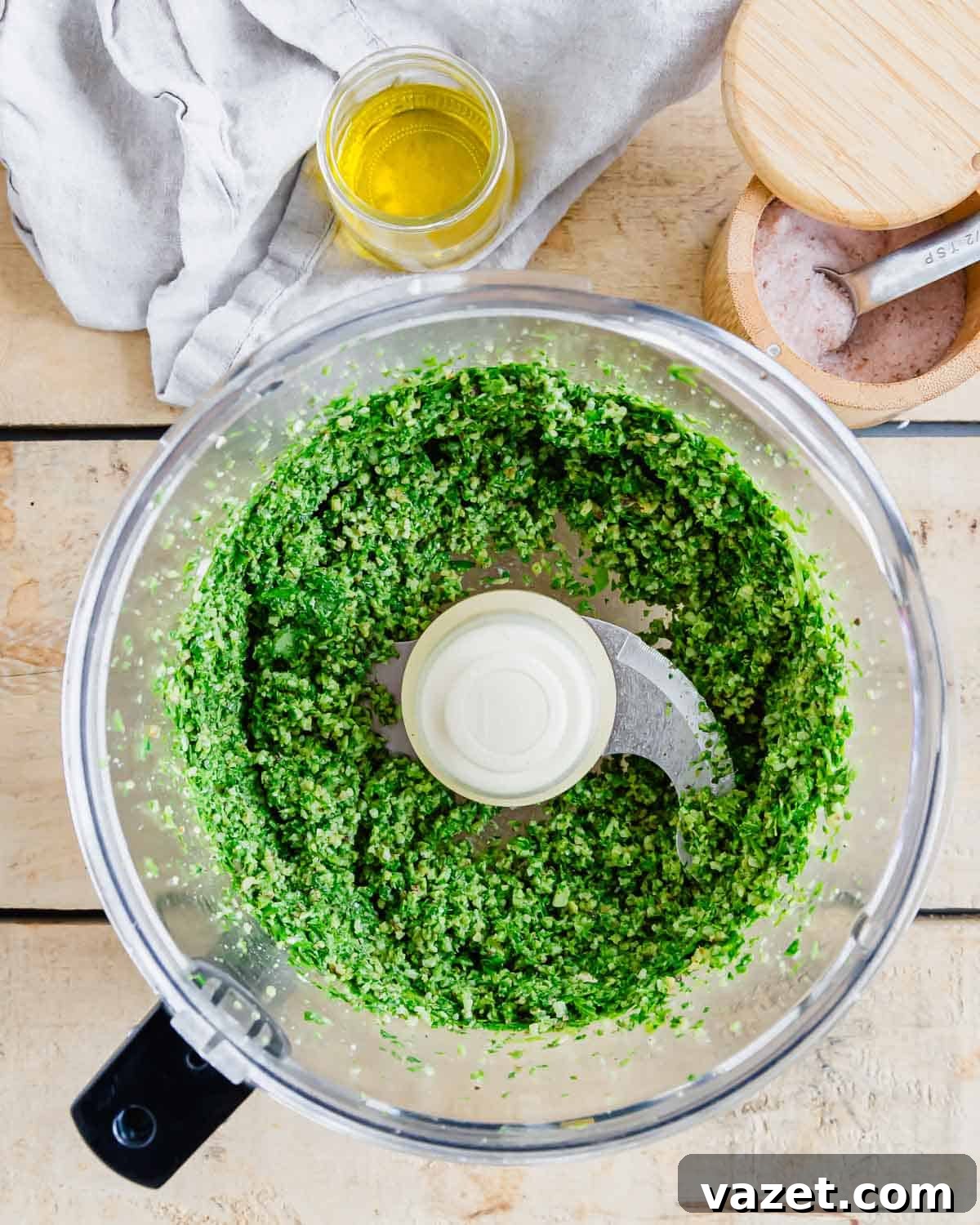 Arugula pesto in a food processor.