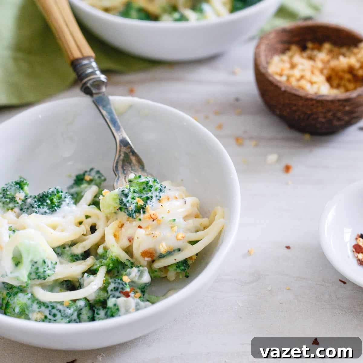 Creamy, cheesy and super decadent, you'll never know this lightened up spaghetti alfredo is a healthier spin on the classic pasta dish.