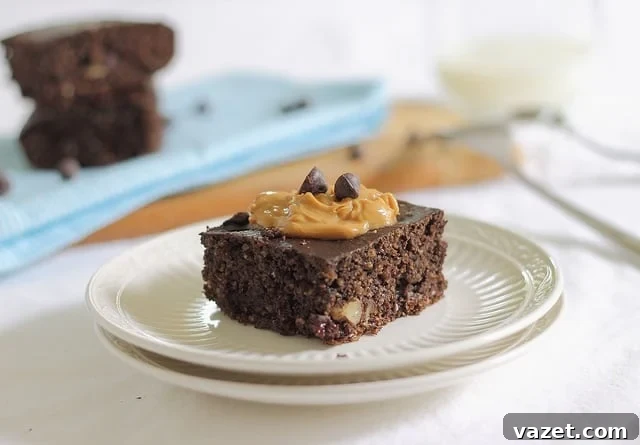 Peanut butter topped chocolate protein cake bars, a perfect blend of flavor and post-workout nutrition.