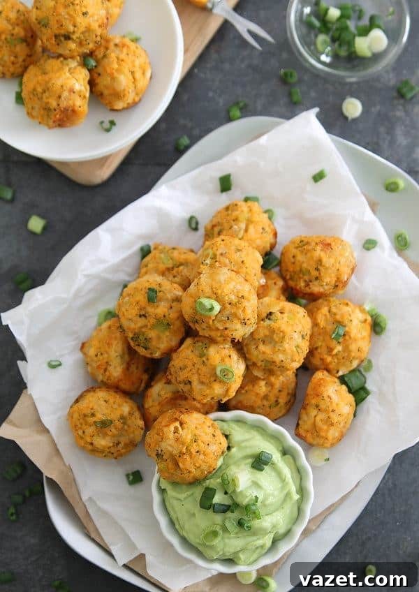Nutritious Buffalo Chicken Bites with broccoli and cheddar, served with dipping sauce.
