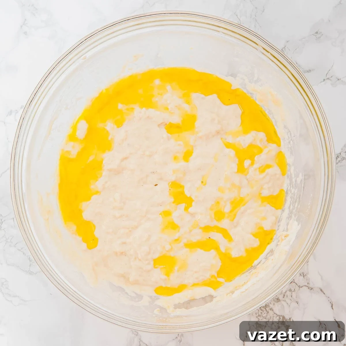 Focaccia dough with olive oil partially blended.